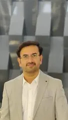 Dr Brijesh K